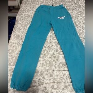 Blue Alpha Phi Madhappy copycat sweatpant joggers with a black drawstring